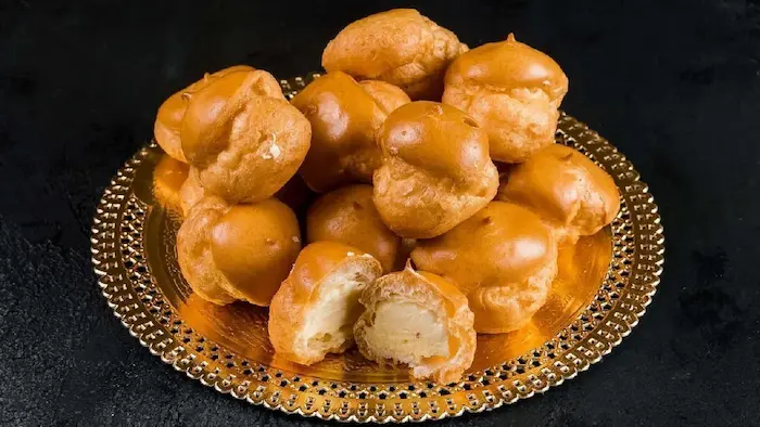 طرز تهیه نون خامه ای نارنجکی در خانه 957684395634