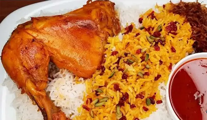 ته چین برنج با ران و سینه مرغ دیزاین شده با زرشک 65465545610